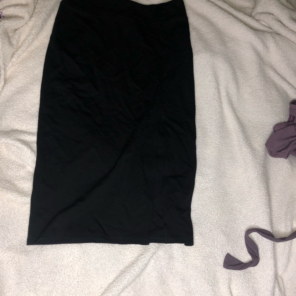 Black pencil skirt with a slit